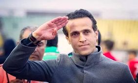  واکنش علی کریمی به شایعه مهاجرتش/ عکس

