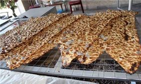 فروش اجباری نان دو رو کنجد تخلف و گرانفروشی است
