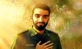 تصویری دیده نشده از شهید حججی و فرزندش