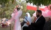  حرکت کاروان زوج‌های جانفدا از امام حسین (ع) به سمت میدان آزادی تهران/ ویدئو